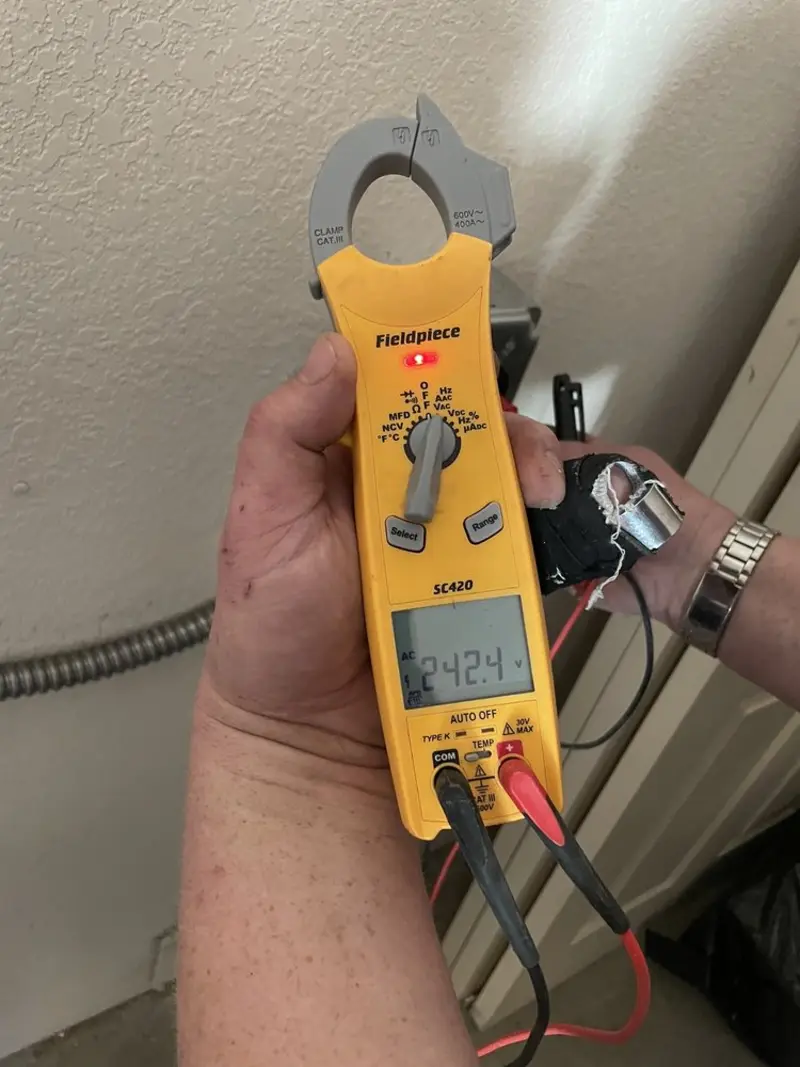 Voltage testing with clamp meter during Aluminum Wiring Replacement in Archbold